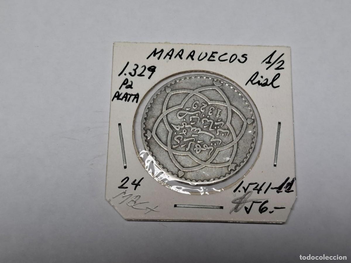 Monedas antiguas de &Aacute;frica: 1/2 de RIAL de PLATA de 1329 Pa KM 24 MARRUECOS en MBC+