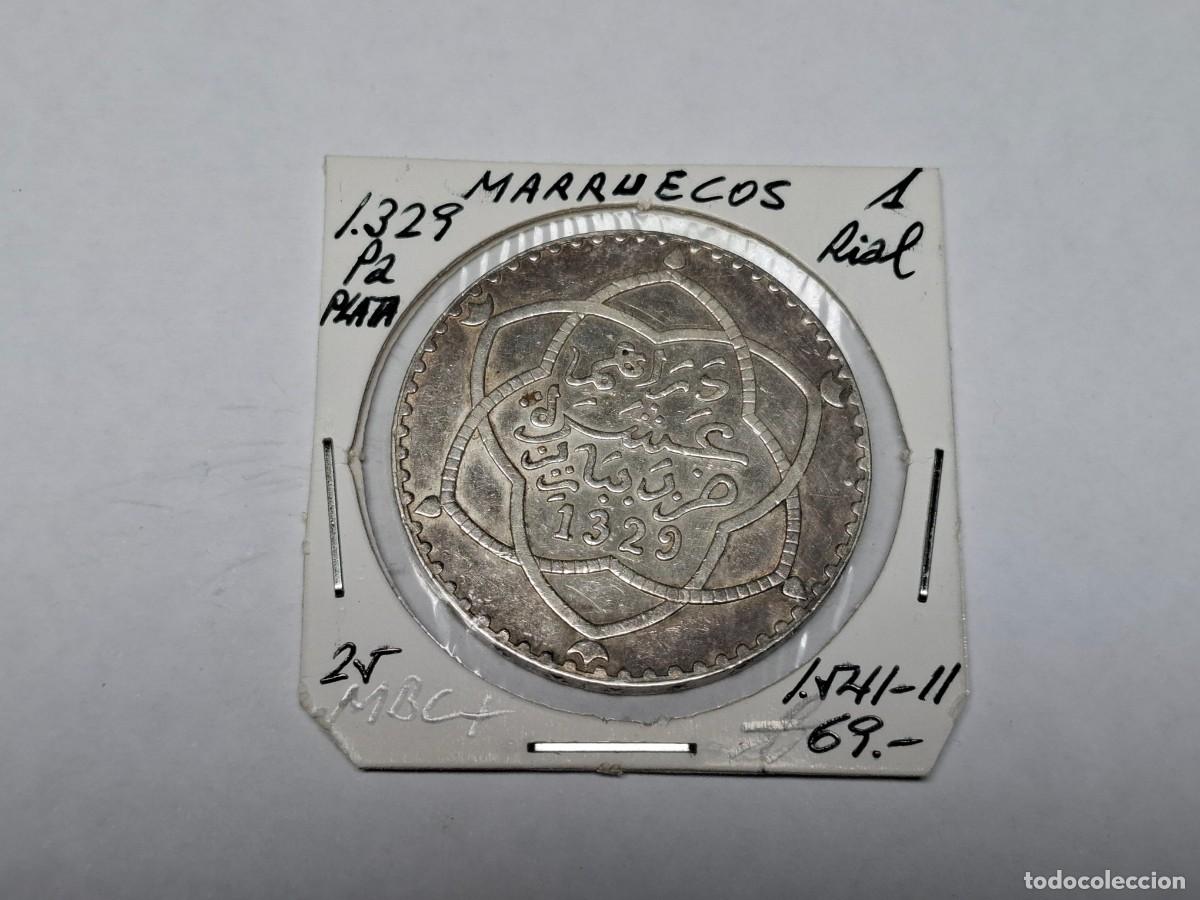 Monedas antiguas de &Aacute;frica: 1 RIAL de PLATA de 1329 Pa KM 25 MARRUECOS en MBC+