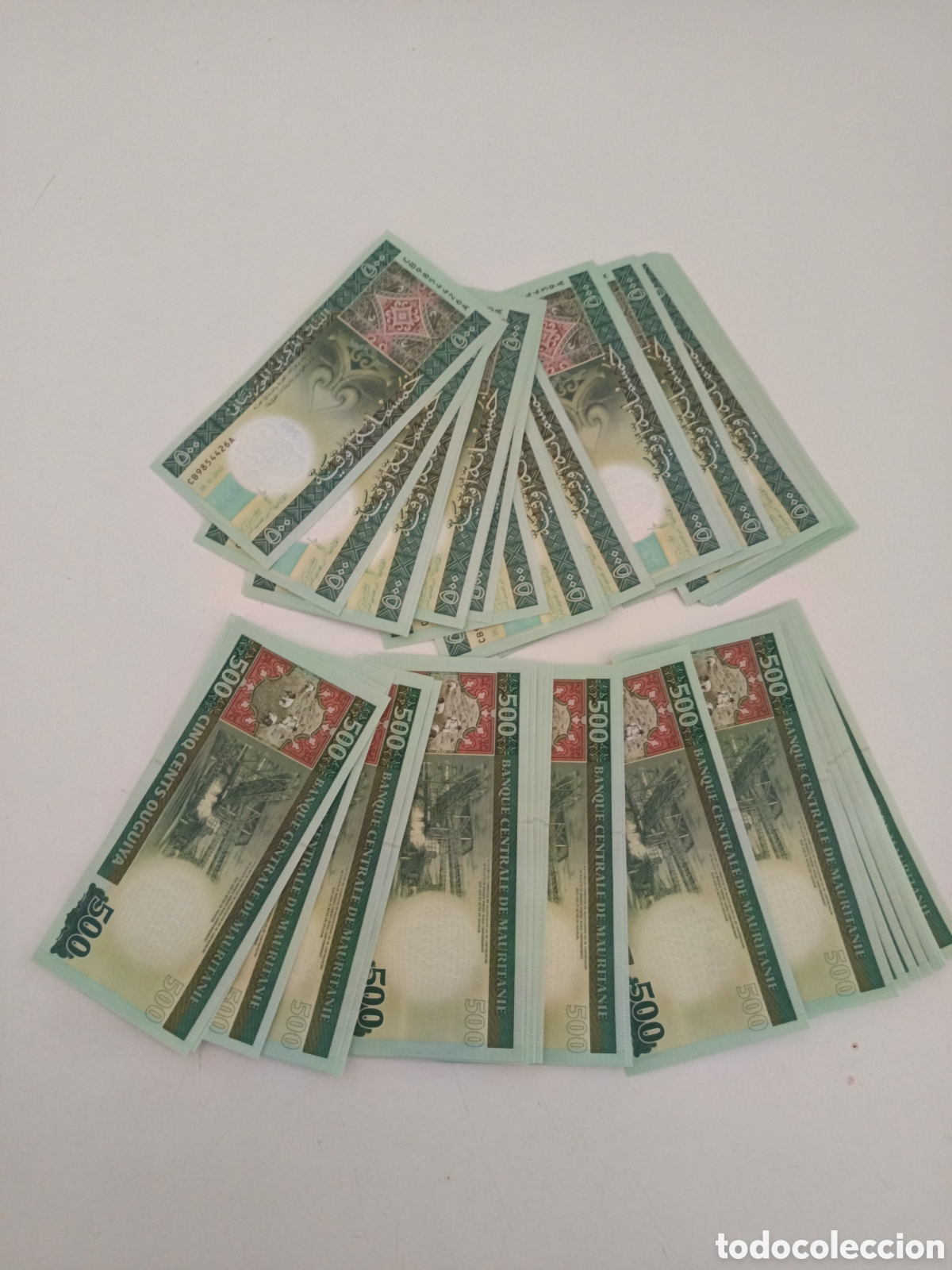 Monedas antiguas de &Aacute;frica: Lote de 50 billetes de Mauritania. Series correlativas. Uguyllas