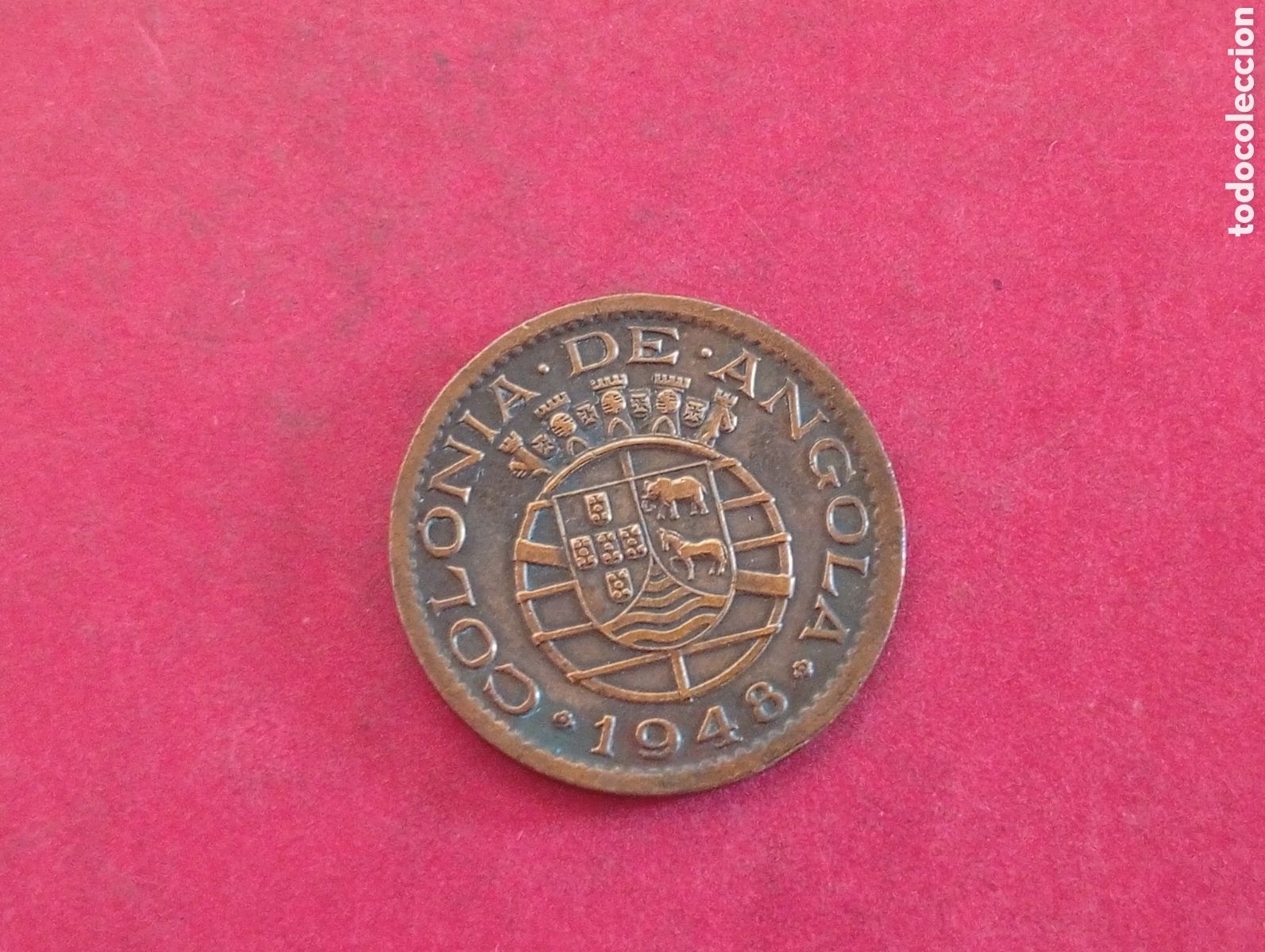 Monedas antiguas de &Aacute;frica: 20 centavos de Angola 1948