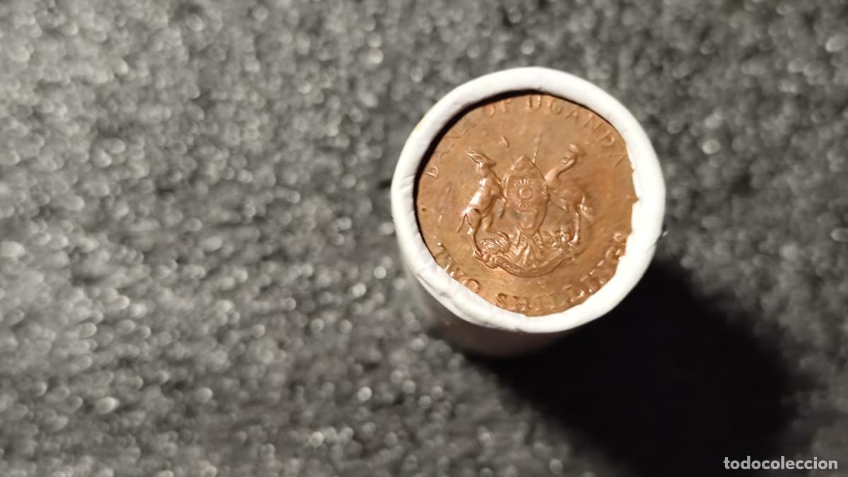Alte M&uuml;nzen aus Afrika: Uganda &ndash; Cartucho original con 20 monedas de 2 Chel&iacute;n 1987, Mixto &ndash; Rollos de Banco &ndash; Lote 2544