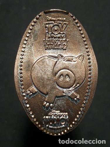 Monedas antiguas de Am&eacute;rica: moneda one cent elongada hamm dr tocino toy story