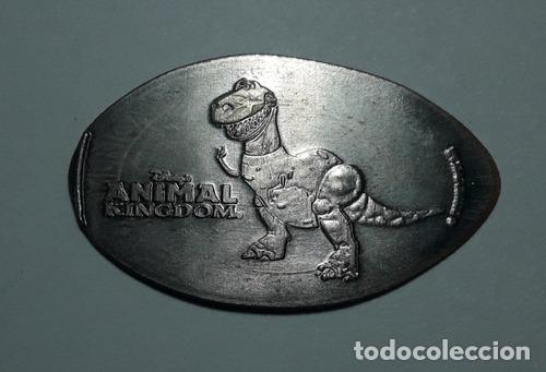 Monedas antiguas de Am&eacute;rica: moneda 25 cent elongada animal kingdom t rex toy story