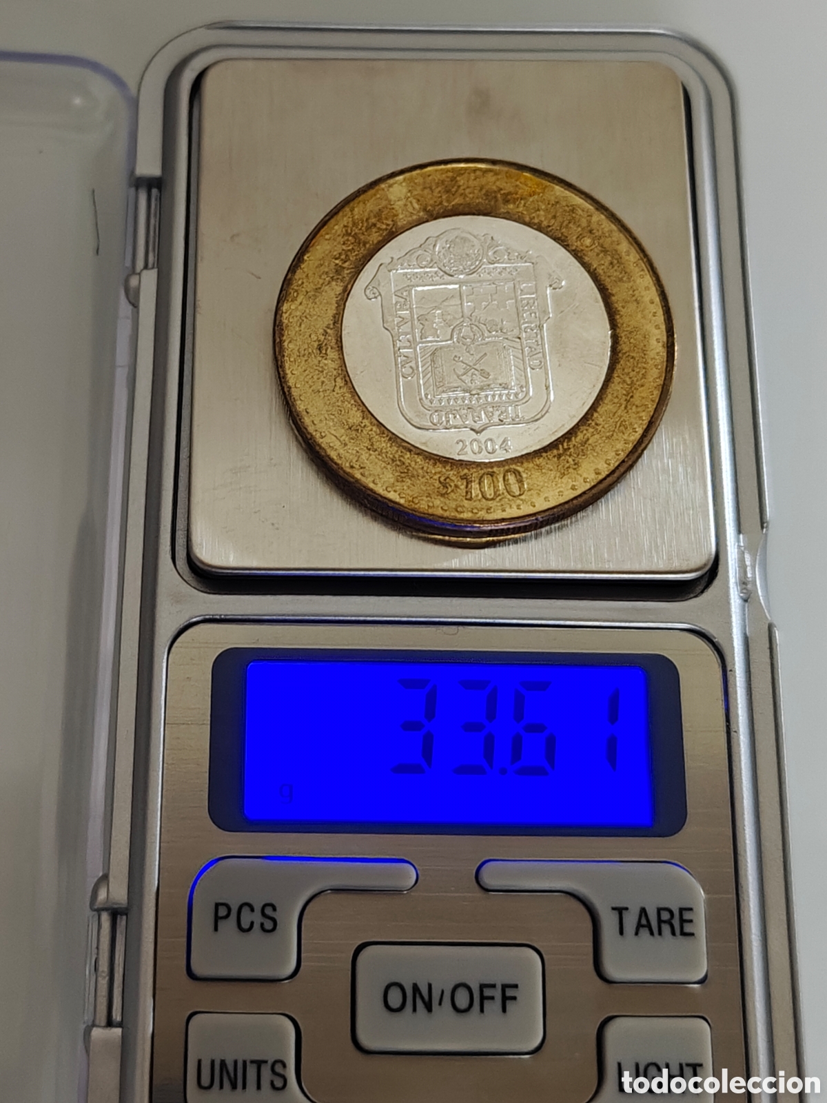 moneda 100 pesos 2004 estado de méxico bimetáli - Compra venta en  display picture 1