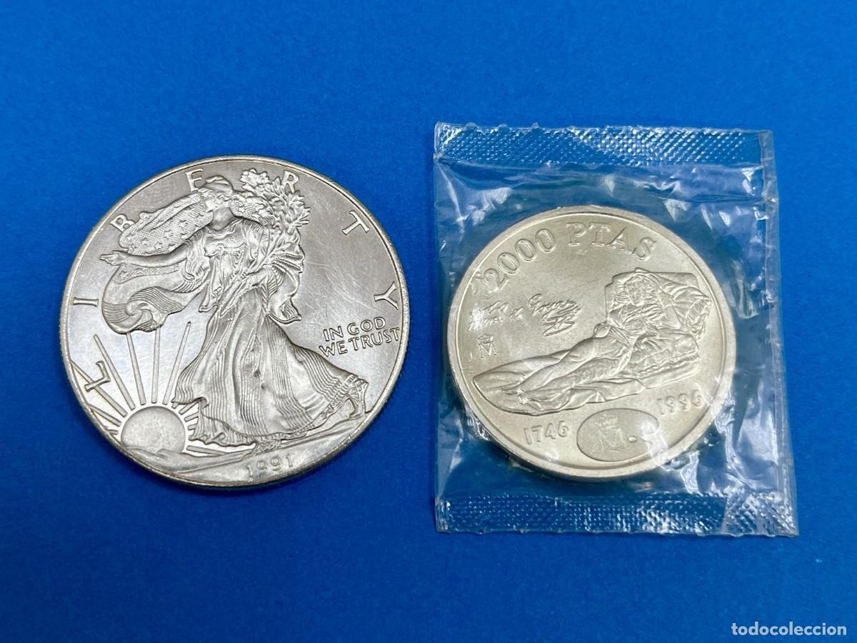 Monedas antiguas de Am&eacute;rica: Onza Plata American Eagle y moneda de Plata 2000 Pesetas.