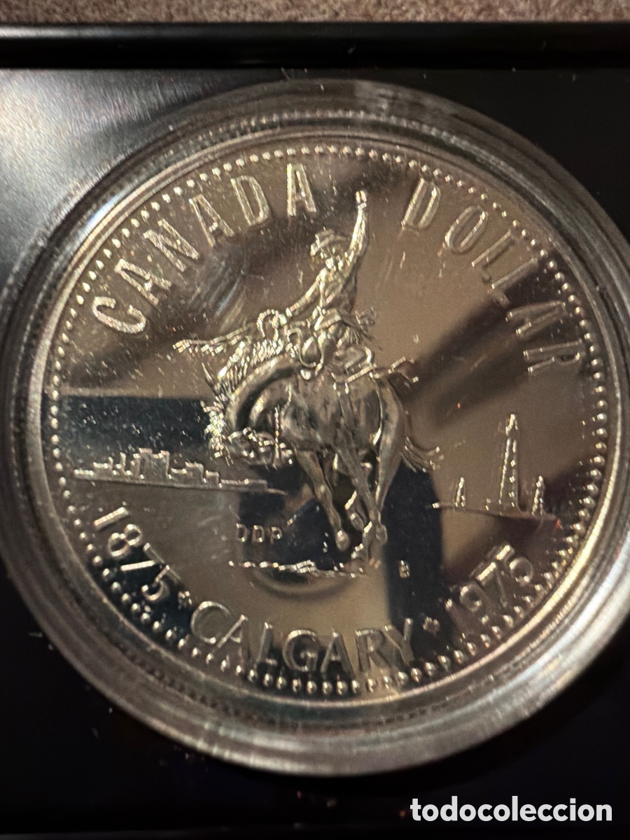 Monedas antiguas de Am&eacute;rica: Dollar de plata de 1975 centenario de Calgary