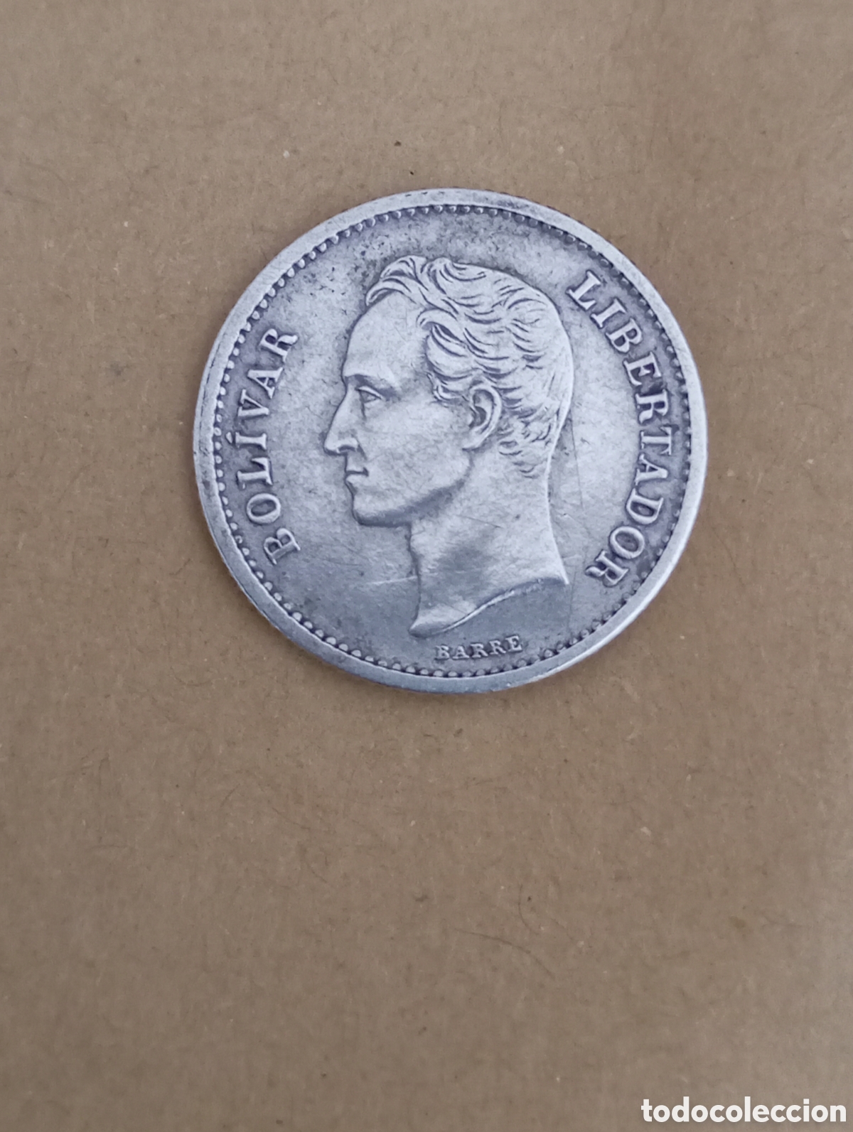 Monedas antiguas de Am&eacute;rica: 25 c&eacute;ntimos de Bol&iacute;var de plata de Venezuela.