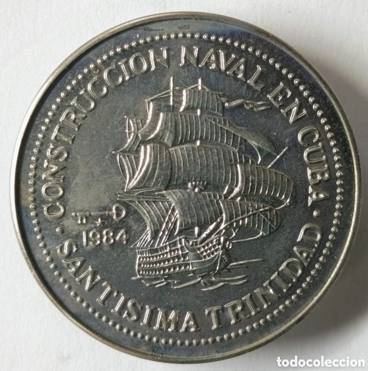 Monedas antiguas de Am&eacute;rica: CUBA. MONEDA DE UN PESO 1984. &ldquo;CONSTRUCCI&Oacute;N NAVAL EN CUBA&rdquo;. COBRE-N&Iacute;QUEL. RARA