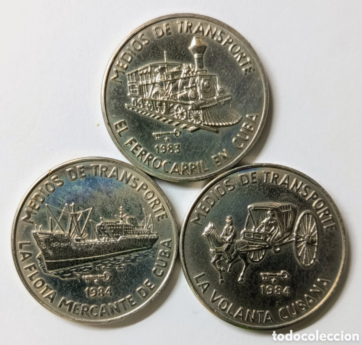 Monedas antiguas de Am&eacute;rica: CUBA. 3 MONEDAS DE UN PESO 1983/84. &ldquo;MEDIOS DE TRANSPORTE&rdquo; COBRE-N&Iacute;QUEL. ESCASAS