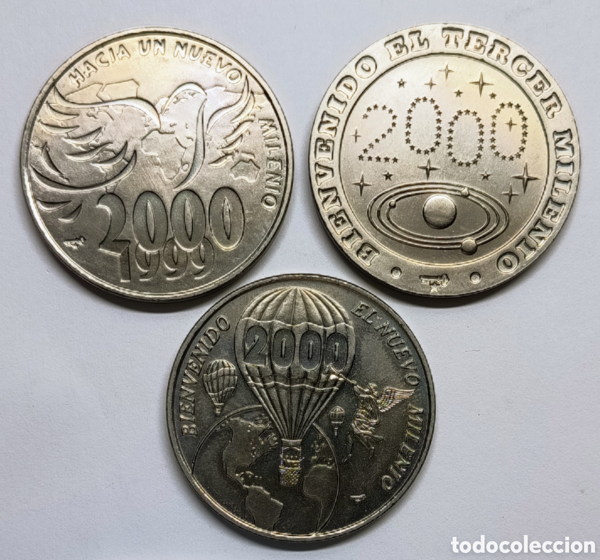 Monedas antiguas de Am&eacute;rica: CUBA. 3 MONEDAS DE UN PESO. 2000. &ldquo;HACIA UN NUEVO MILENIO&rdquo;. COBRE-N&Iacute;QUEL. RARAS