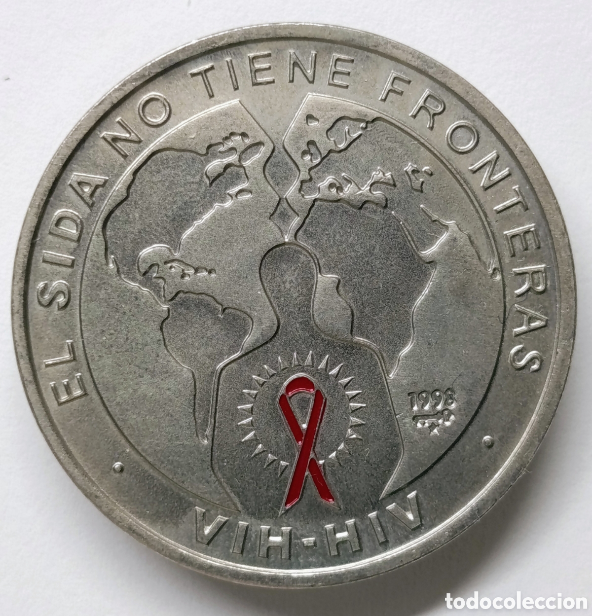 Monedas antiguas de Am&eacute;rica: CUBA. MONEDA DE UN PESO. 1998. &ldquo;EL SIDA NO TIENE FRONTERAS&rdquo;. COBRE-N&Iacute;QUEL CON COLOR.