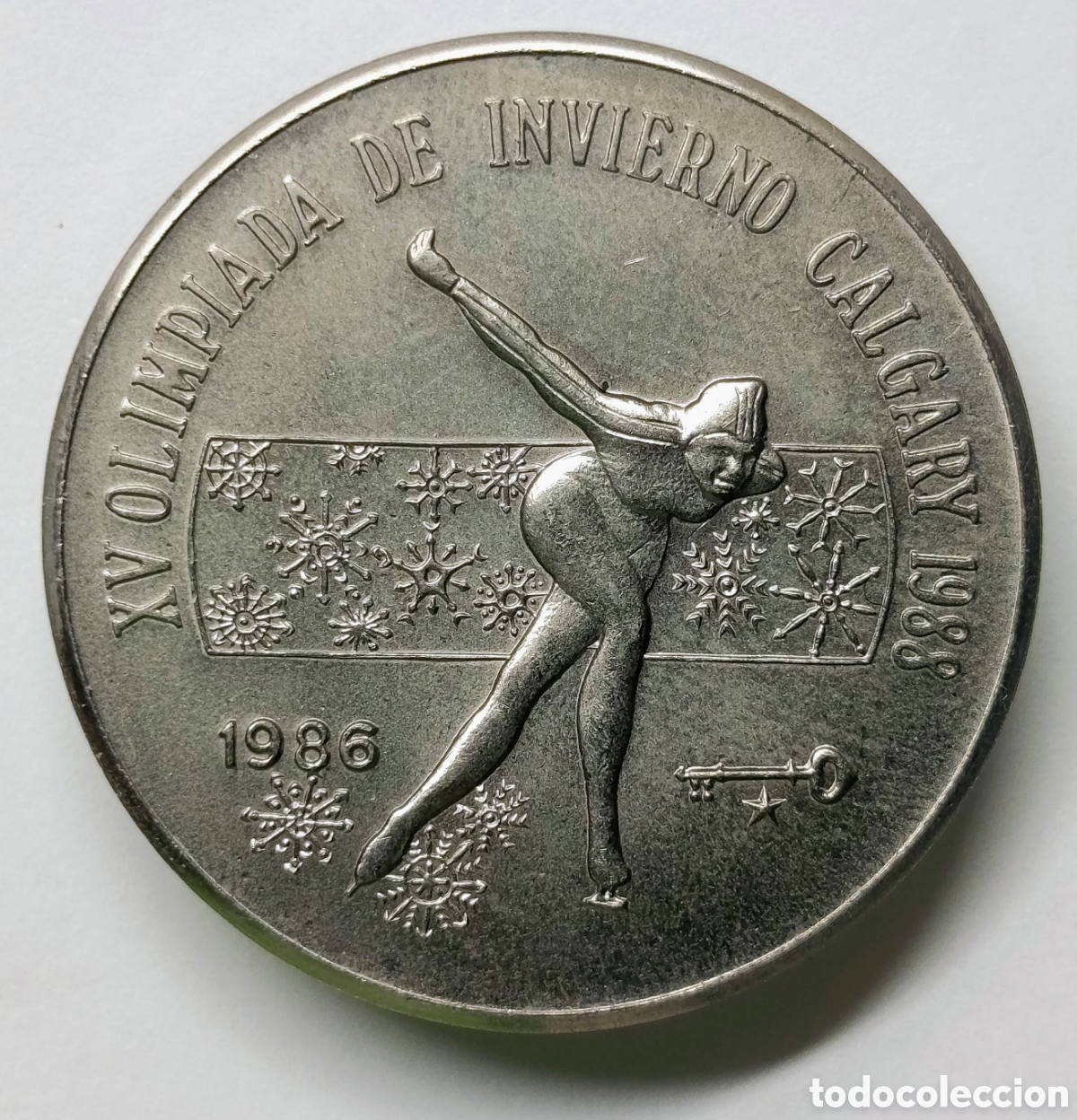 Monedas antiguas de Am&eacute;rica: CUBA. 1 PESO 1986 &ldquo;XV OLIMPIADA DE INVIERNO CALGARY 1988&rdquo;. COBRE-N&Iacute;QUEL. RARA.