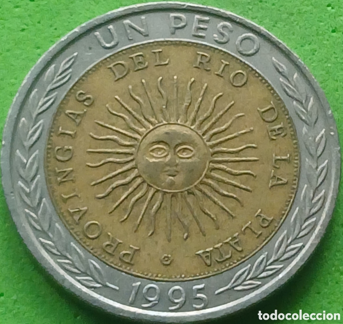 Monedas antiguas de Am&eacute;rica: Argentina 1 peso 1995 km#112 marca de ceca &rdquo;B&rdquo;, flor de 6 lados sobre la fecha. Error &rdquo;PROVINGIAS&rdquo;