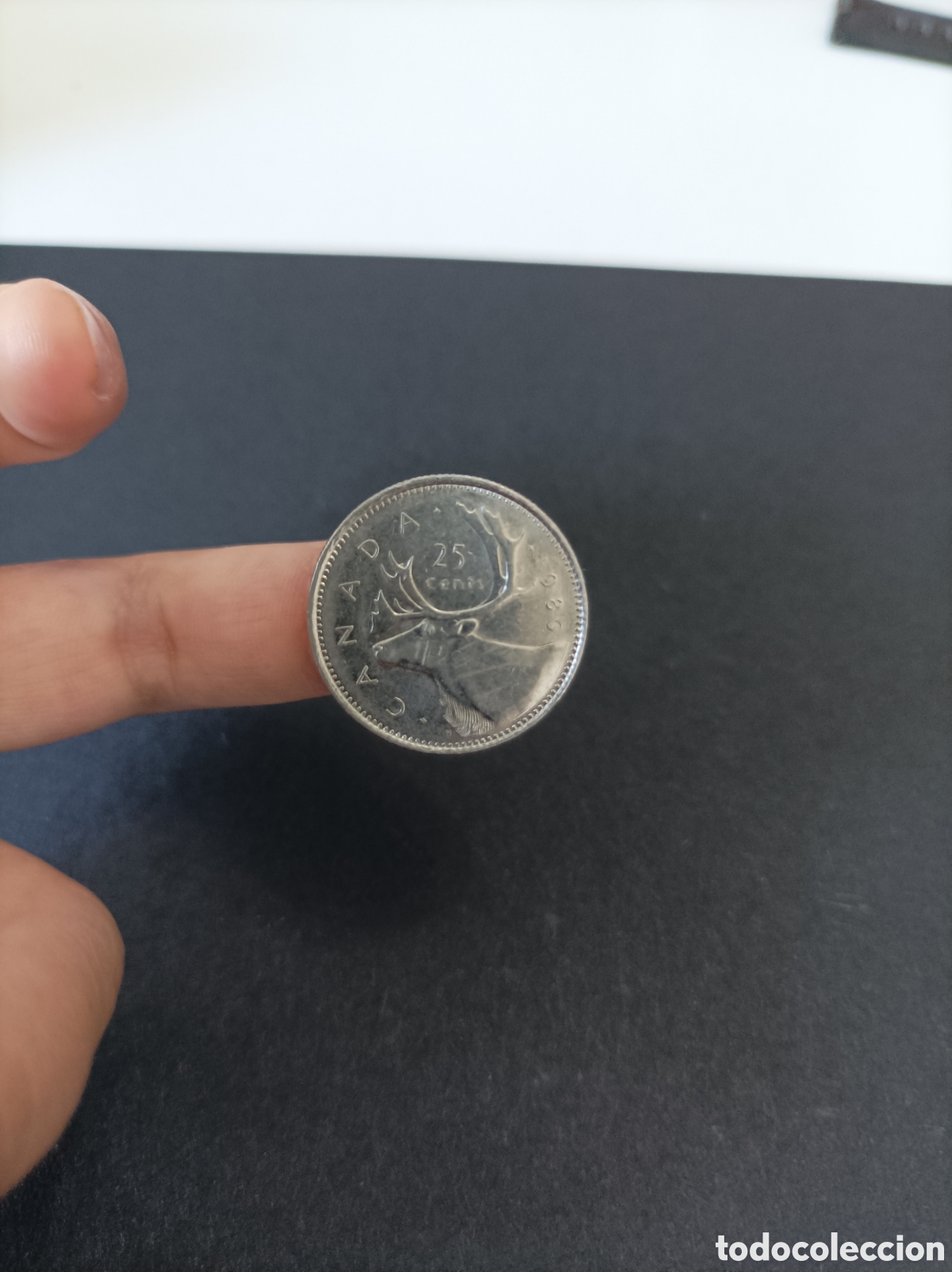Monedas antiguas de Am&eacute;rica: 25 c&eacute;ntimos de Canad&aacute; de 1986