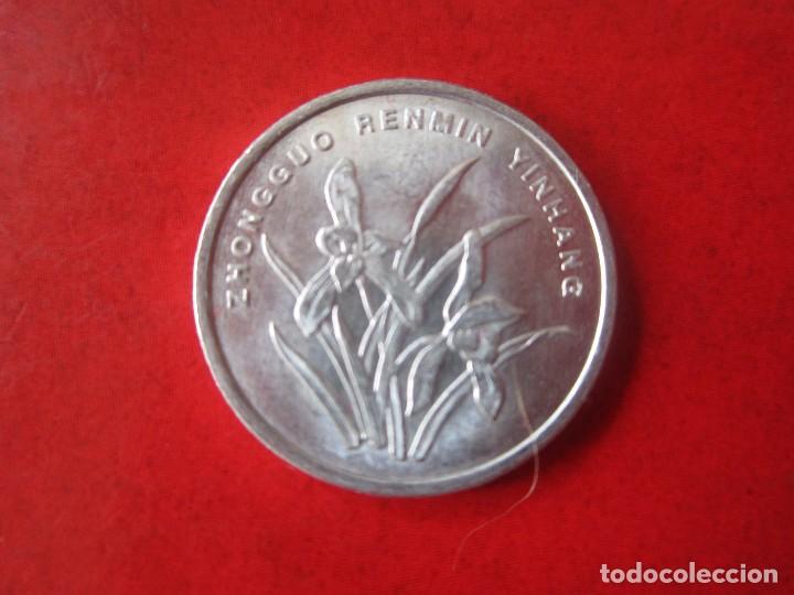 Monedas antiguas de Asia: China. moneda de 1 jiao. 2000 - Foto 1
