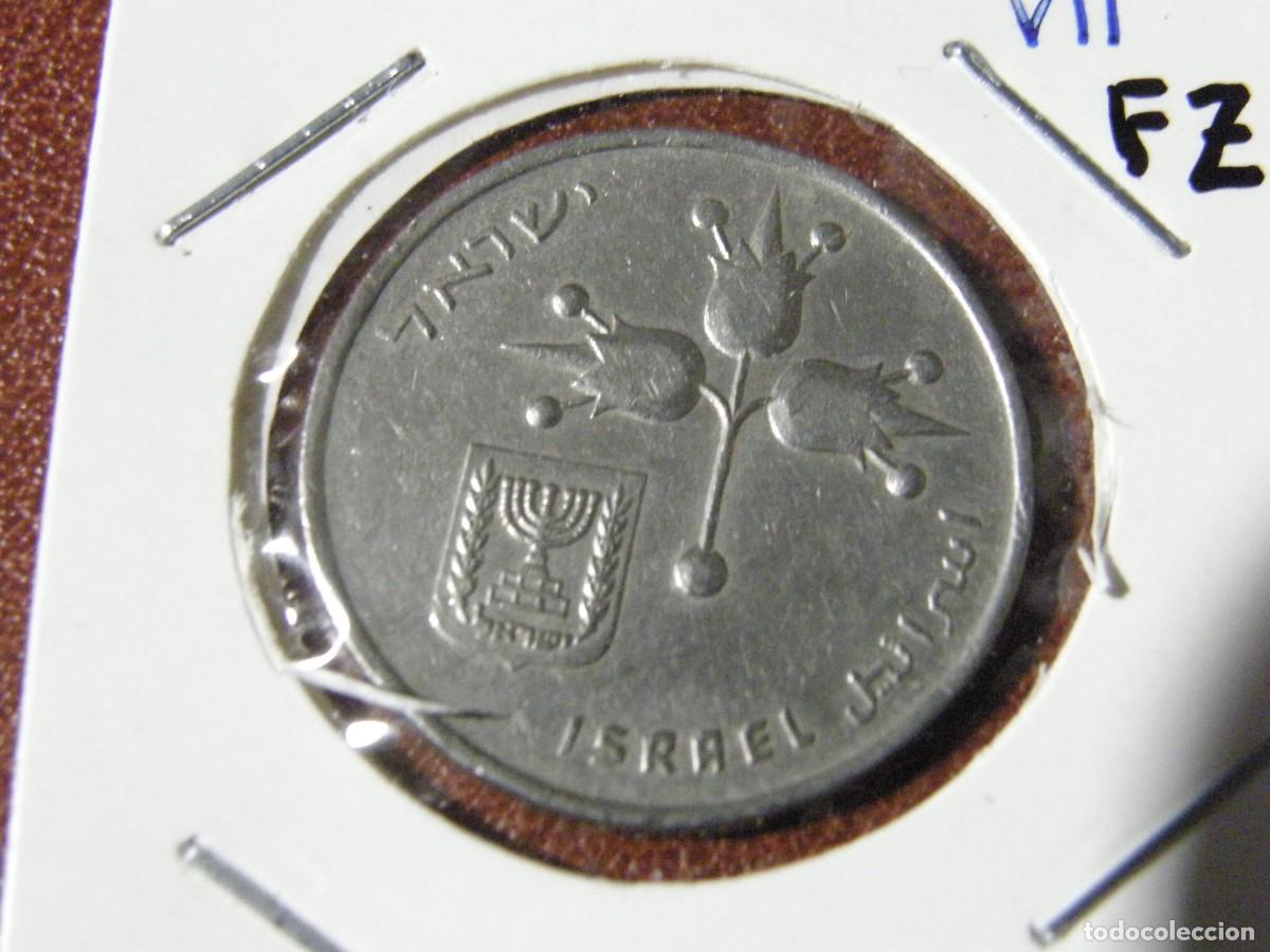 Monete antiche di Asia: Moneda de 1 Lira Israel&iacute; 1967-1980 &ndash; Menor&aacute; y planta de tres flores, pieza moderna de Israel