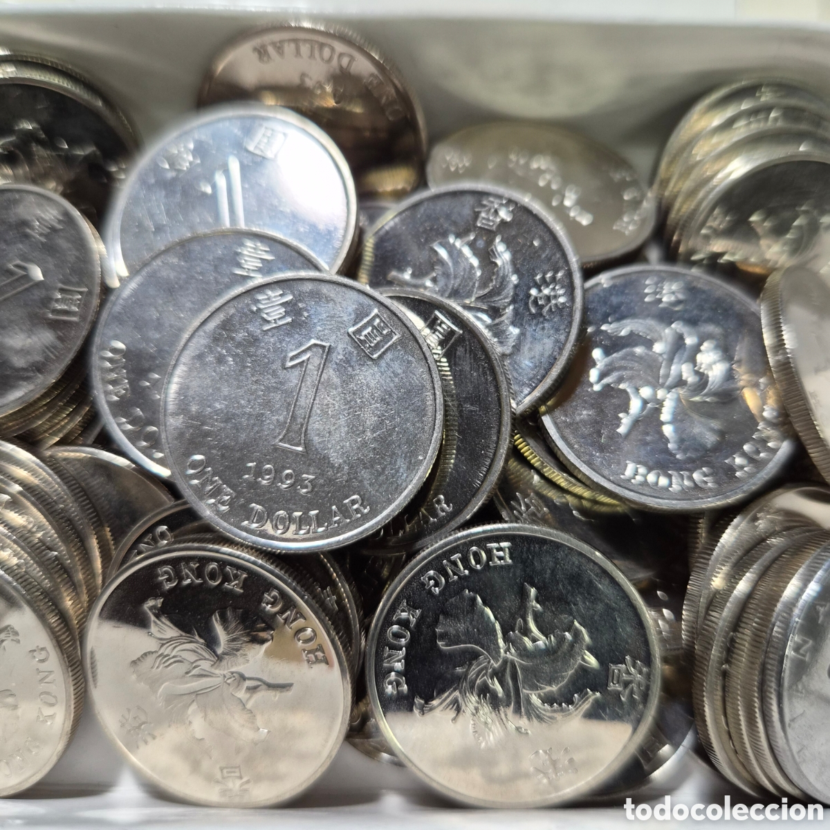 Monedas antiguas de Asia: Lote de 60 monedas de Hong Kong de 1 dolar