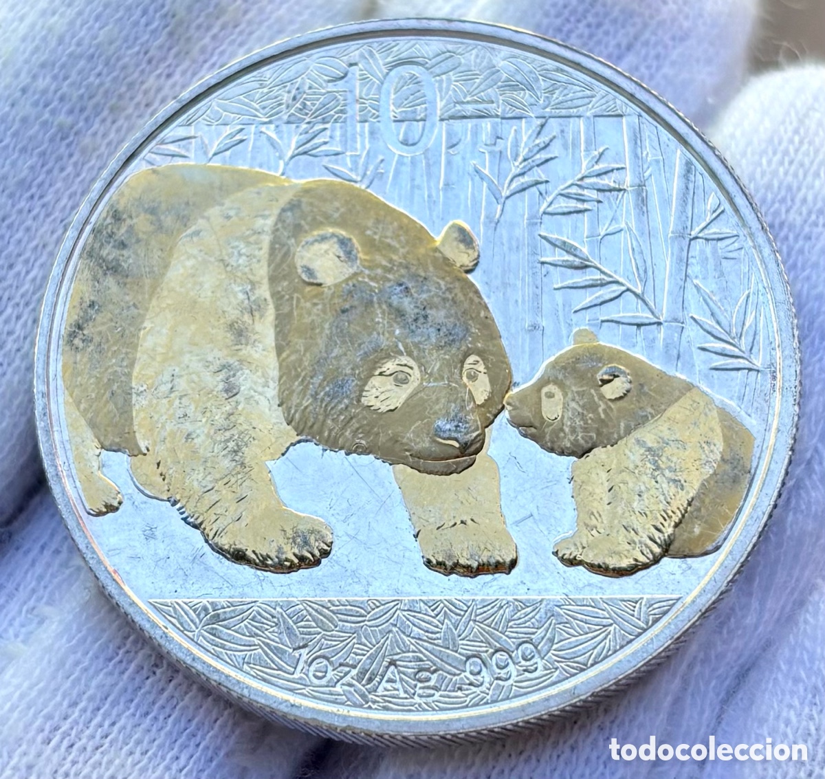 Monedas antiguas de Asia: ONZA PLATA CHINA 10 Yuan 2011 Panda Dorado. 1 Oz 999