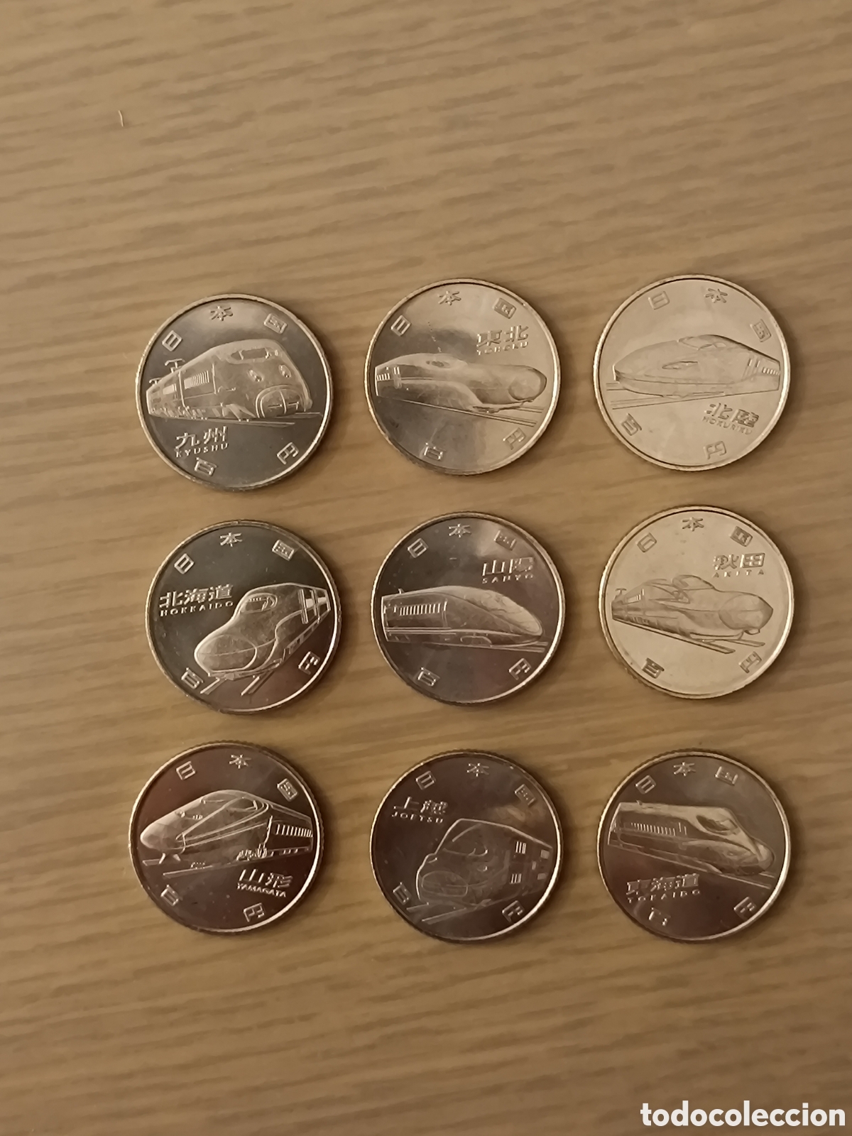 Monnaies anciennes d'Asie: 9 monedas 100 yenes Jap&oacute;n tren bala (shinkansen)