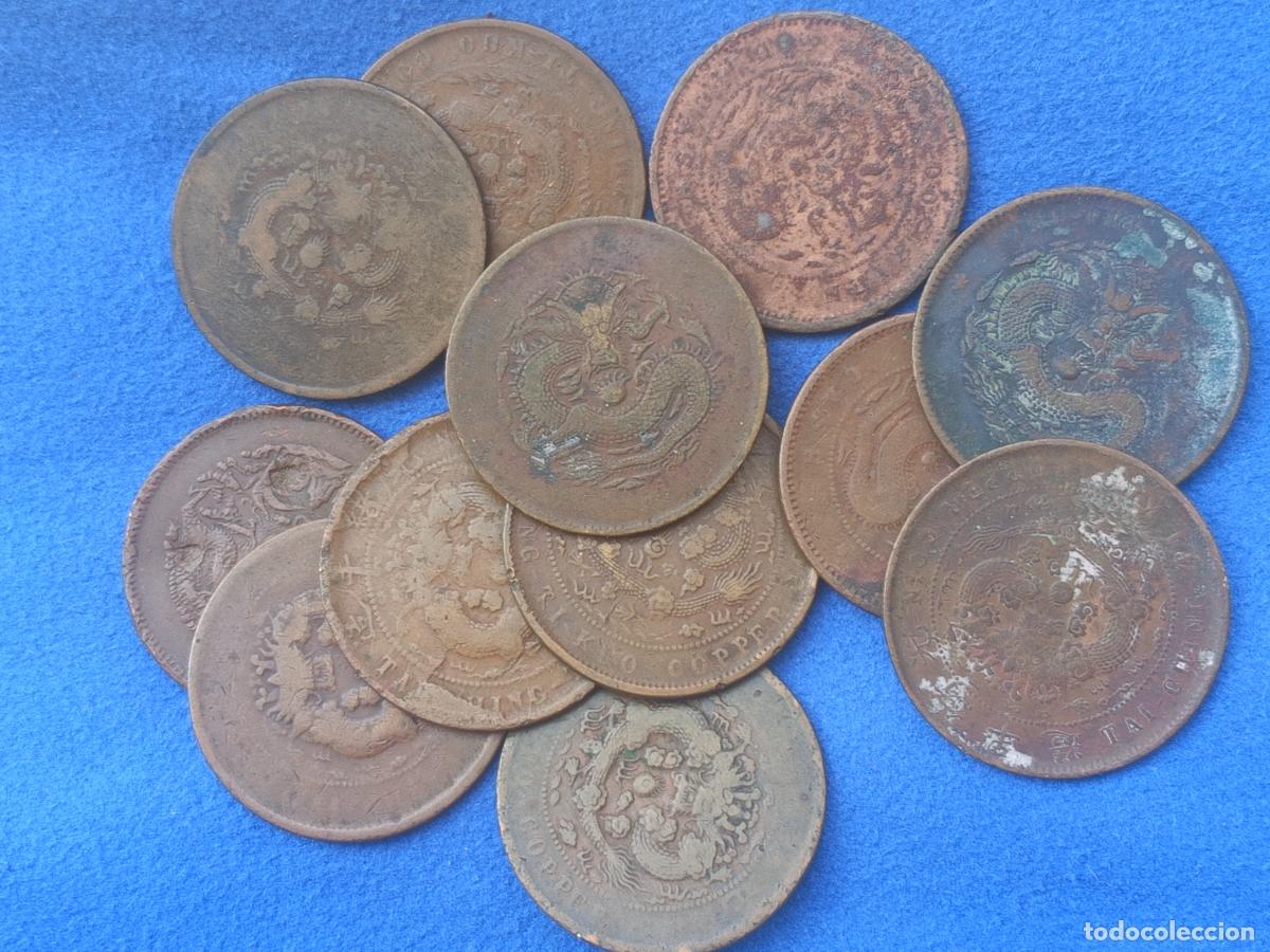 Monedas antiguas de Asia: China: 12 monedas antiguas de 10 cash. Drag&oacute;n
