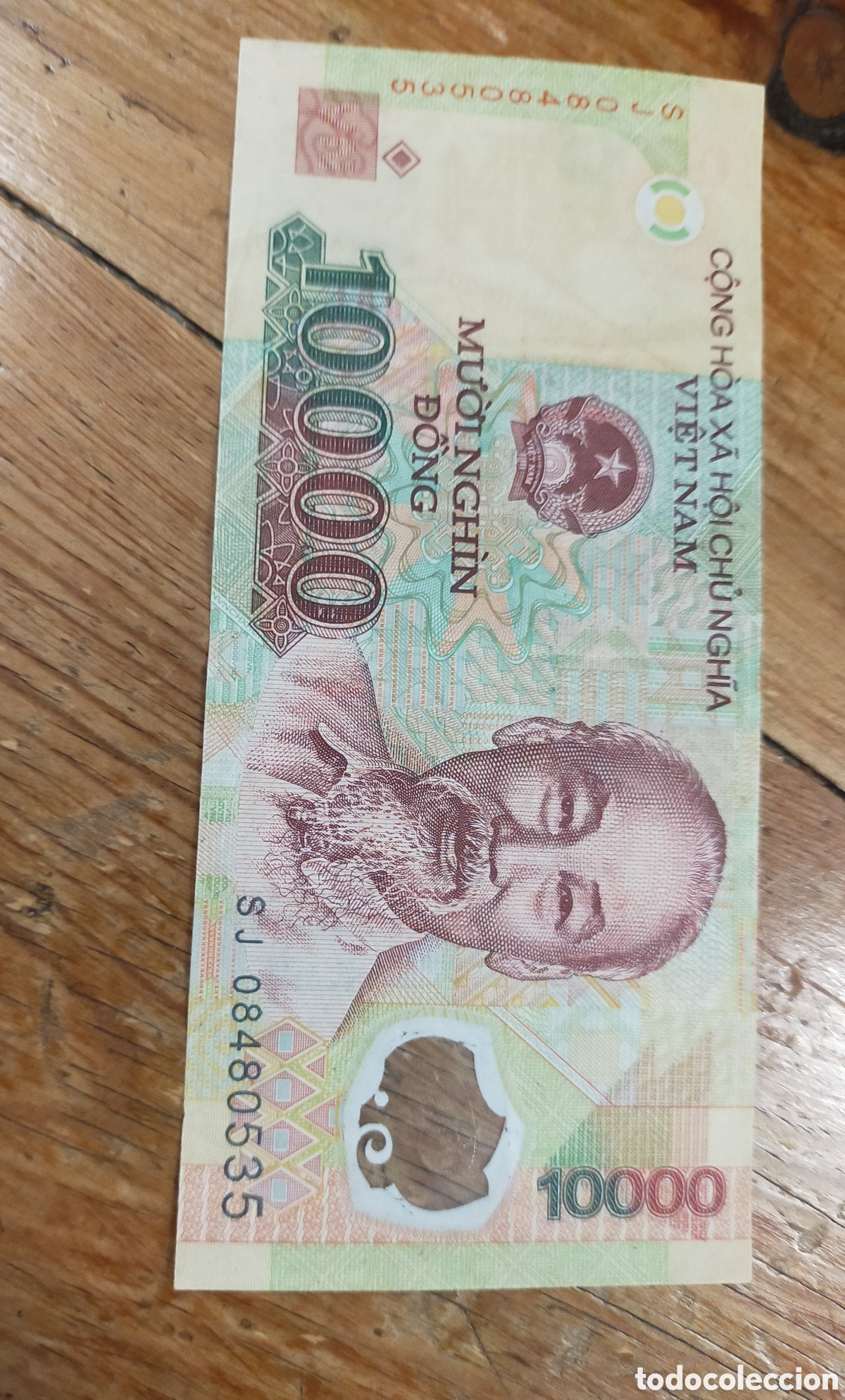 Moedas antigas da &Aacute;sia: billete de 10.000 dongs vietnamitas