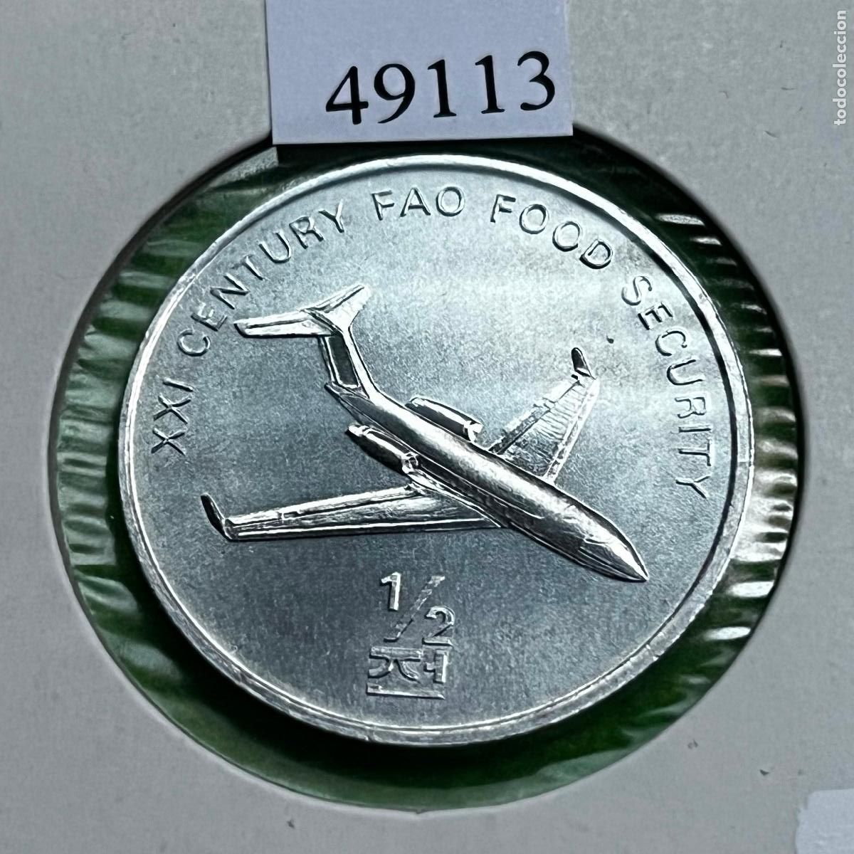Monedas antiguas de Asia: Corea del Norte &frac12; Chon 2002, FAO, avion a reacci&oacute;n, Korea