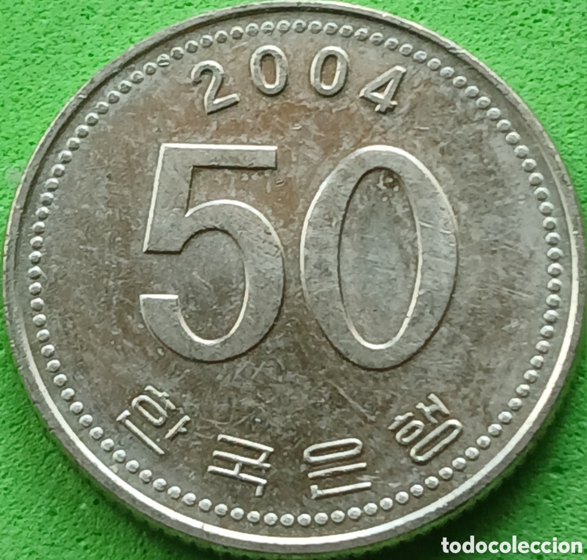 Monedas antiguas de Asia: Corea del Sur 50 won 2004 km#34 - Foto 1