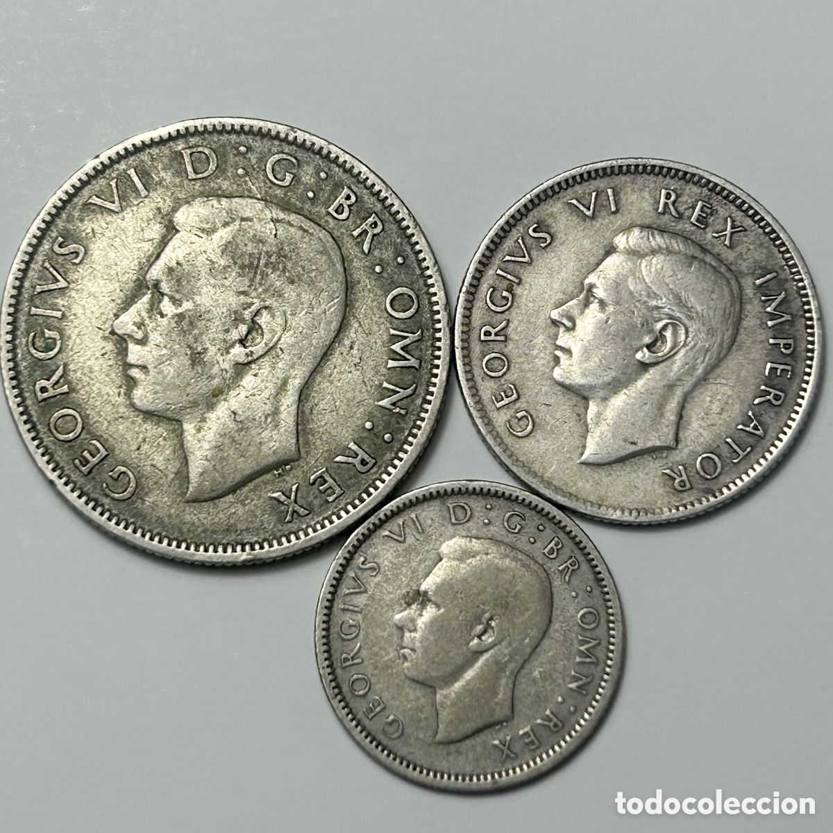 Monedas antiguas de Europa: Reino Unido. Lote tres monedas: 2 florines 1937, 1 flor&iacute;n 1942 y Sixpence 1939. Plata 500