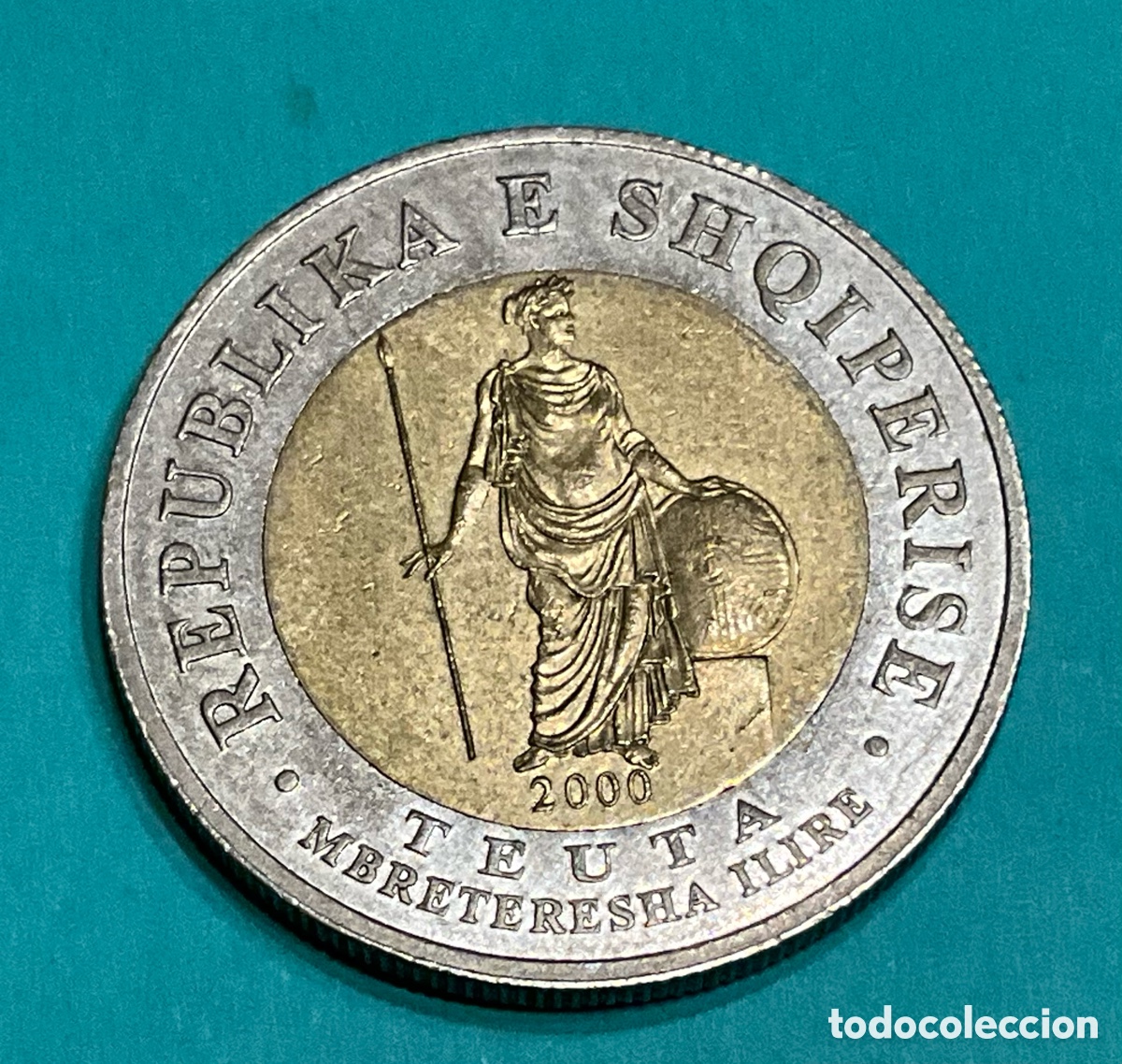 Old Coins of Europe: Moneda Albania 100 Lek&euml; 2000 &ndash; Bimet&aacute;lica &ndash; Reina Teuta de Iliria (KM# 82)