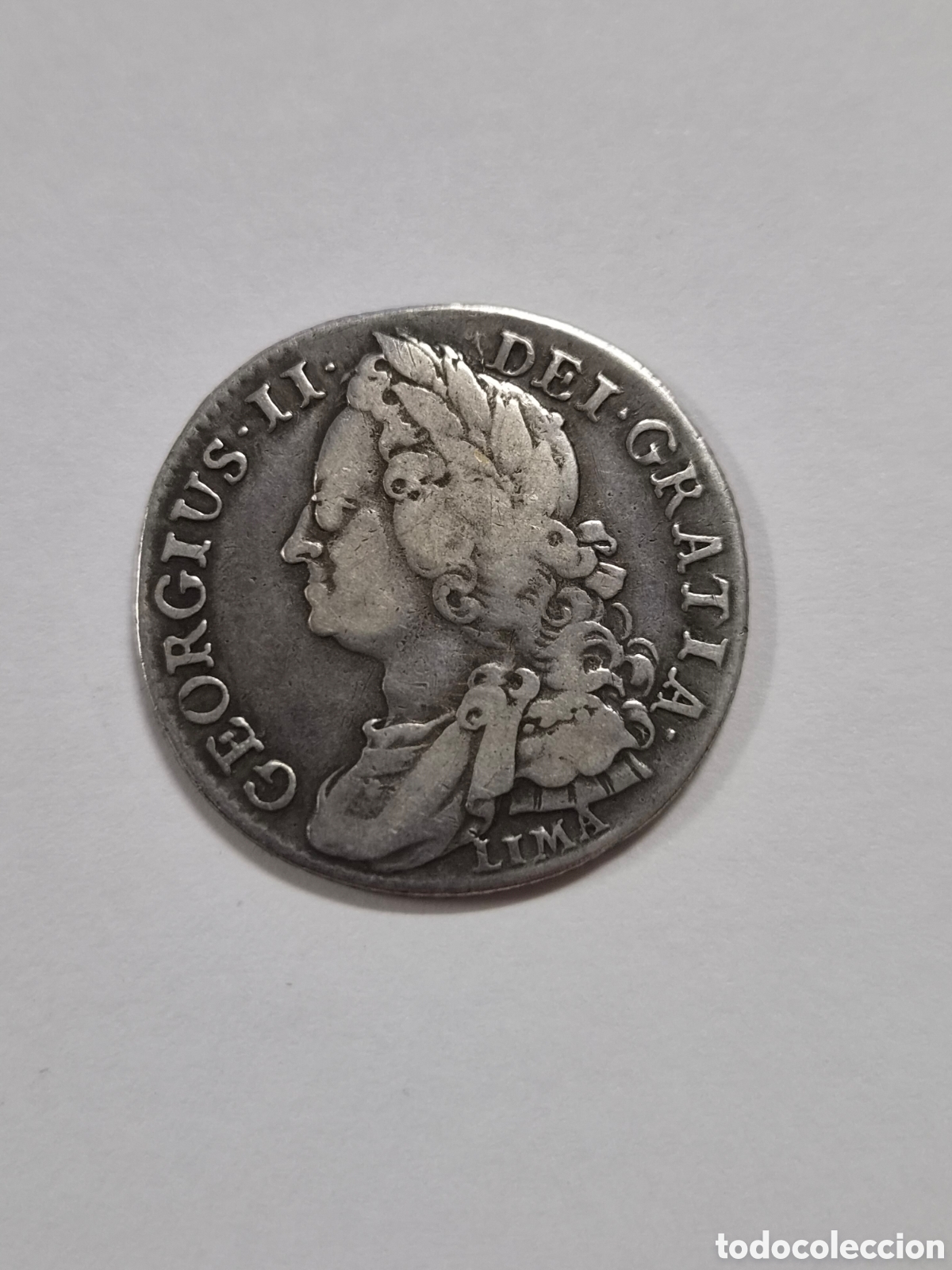 Monedas antiguas de Europa: Shilling de 1745 LIMA de George II*. No es un shilling cualquiera. De plata robada a los espa&ntilde;oles