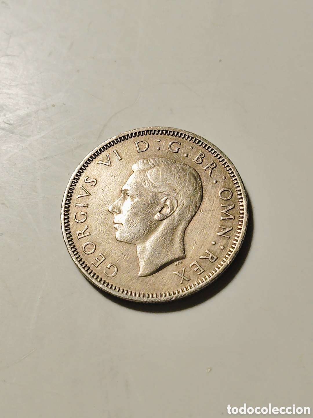 Alte M&uuml;nzen aus Europa: Moneda de Jorge VI. 1 chelin de 1951 ( dise&ntilde;o escoc&eacute;s)