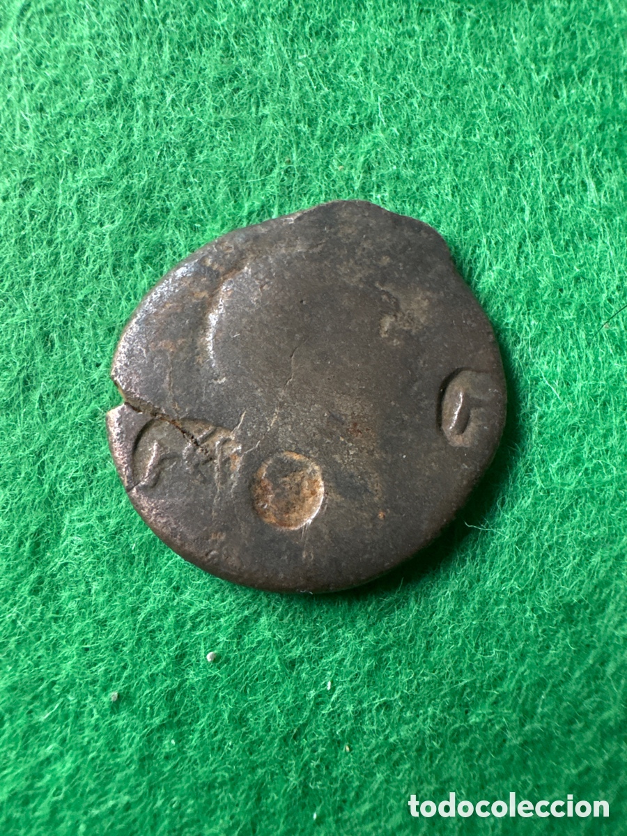 Monnaies Anciennes: Antigua moneda posible romana con resellos (A4)