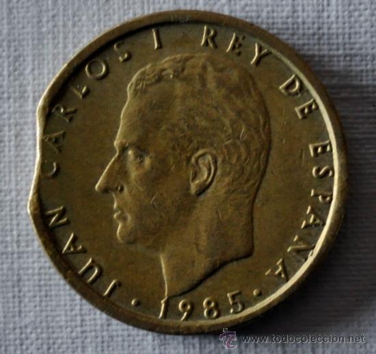 Monedas con errores: Juan Carlos I 100 ptas. 1985 *** ERROR Cu&ntilde;o mal cortado *** - Foto 1