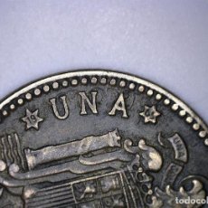 Monedas con errores: ESTADO ESPAÑOL- FRANCO - 1 PESETA 1963*19*65- 3,46 GRMS. INCUSA DETALLES DEL REVERSO EN ANVERSO