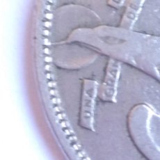 Monedas con errores: 25 PESETAS 1957 *65 CURIOSO ERROR EXCESO METAL-BANDA EN PICO