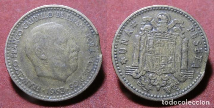 Monedas con errores: Error de acu&ntilde;aci&oacute;n moneda de 1 Peseta 1963*65 Segmentada final de riel - Foto 1
