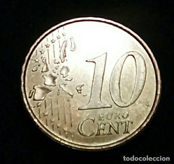 Monedas con errores: Variante error 10 centimos 2003 exceso de material en las estrellas parte derecha anverso S/C de bol - Foto 2