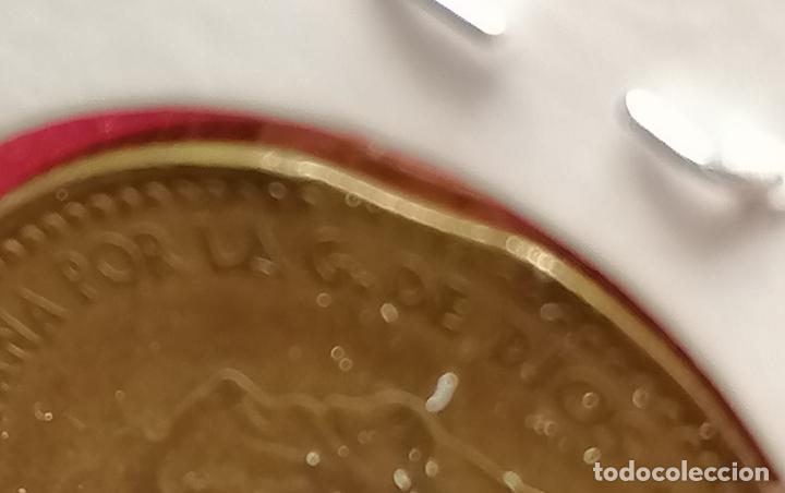Monedas con errores: 1 peseta 1966 * 67 segmentada curva - Foto 4