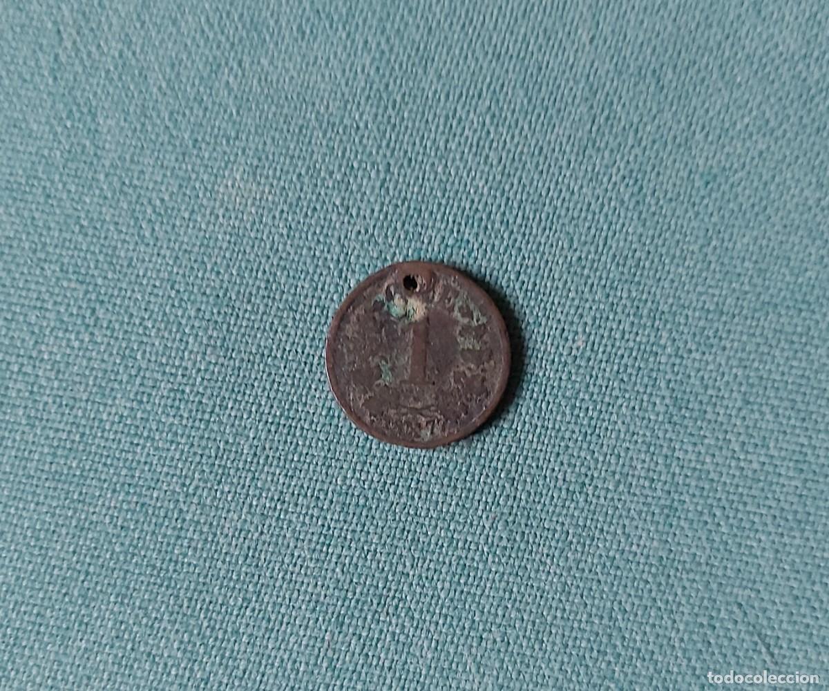 Monedas con errores: Moneda perforada a catalogar - Foto 2