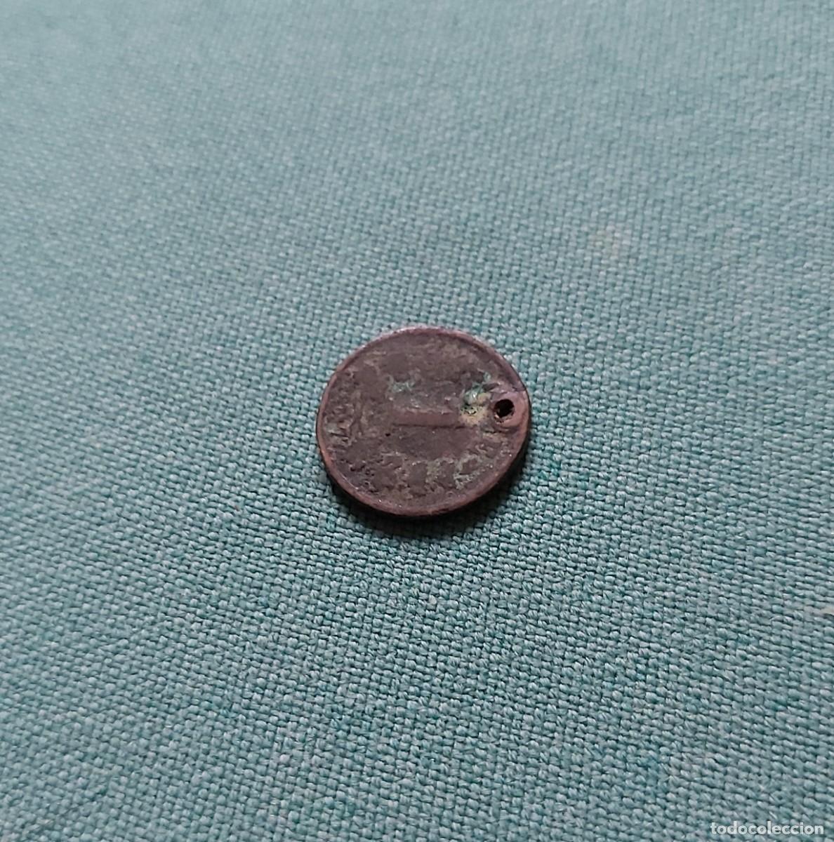 Monedas con errores: Moneda perforada a catalogar - Foto 3