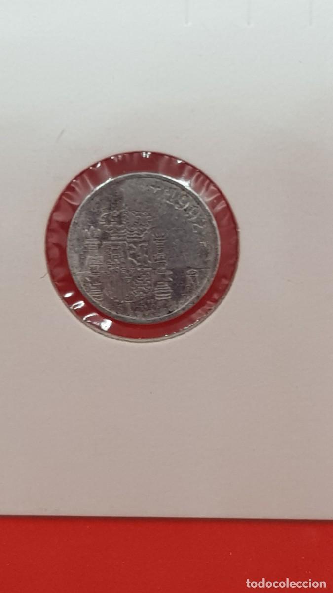 Monedas con errores: 1 PESETA 1992 ERROR DE CU&Ntilde;O-LABIO PARTIDO- - Foto 3