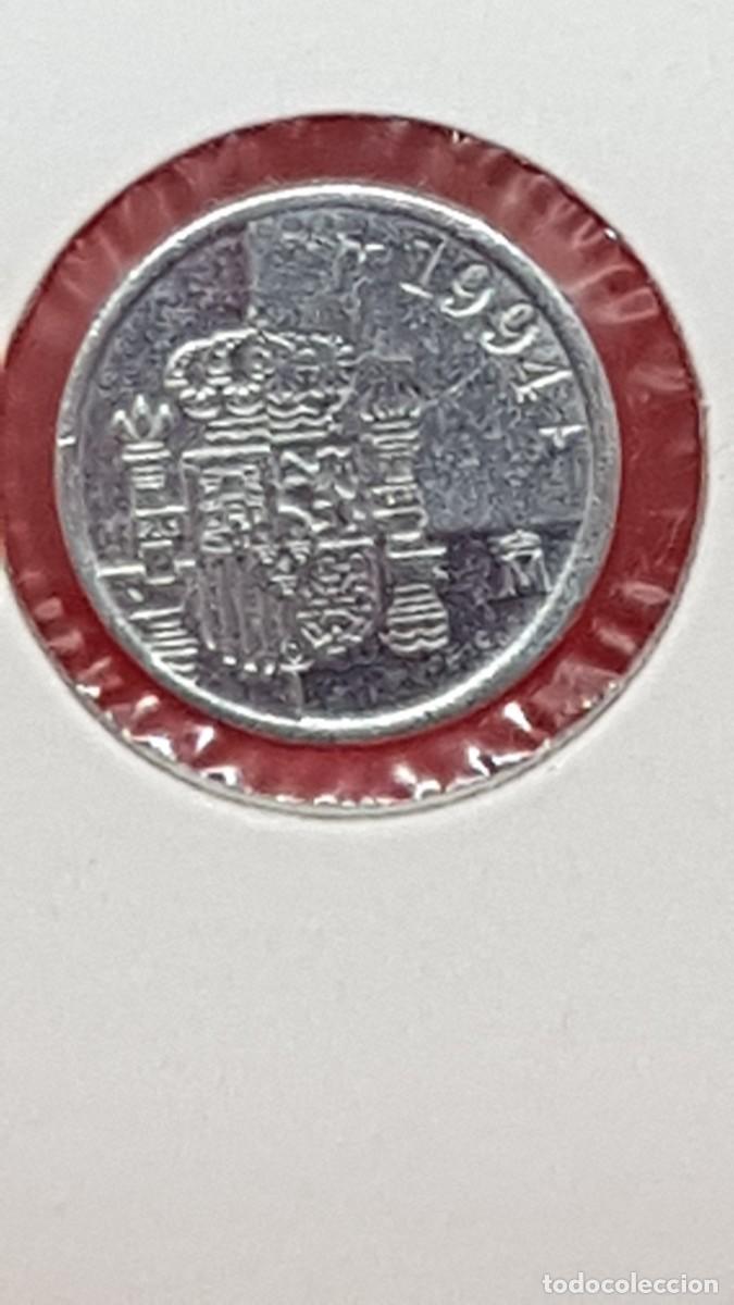 Monedas con errores: 1 PESETA 1994 ERROR DE CU&Ntilde;O-LABIO PARTIDO- - Foto 3
