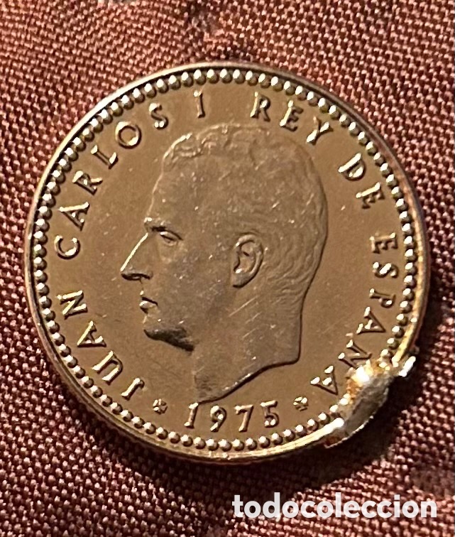 Monete con errori: MONEDA 1 PESETA 1975 ESTRELLA *78. SIN CIRCULAR. ERROR ACUÑACIÓN: EXCESO DE METAL / METAL EXTRA.
