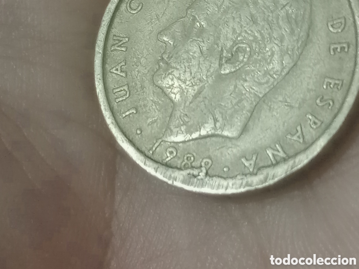 Monedas con errores: 100 pesetas de 1988 o 1989. Defecto en cospel - Foto 1