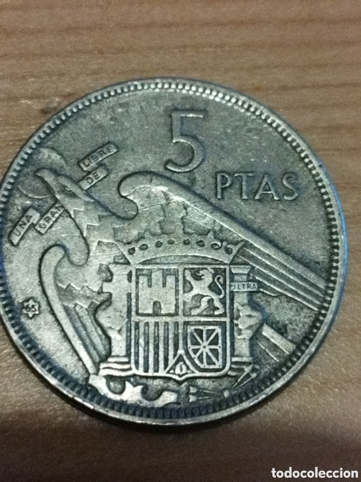 Monedas con errores: Error 5 pesetas de 1957 estrella 65 repinte - Foto 5