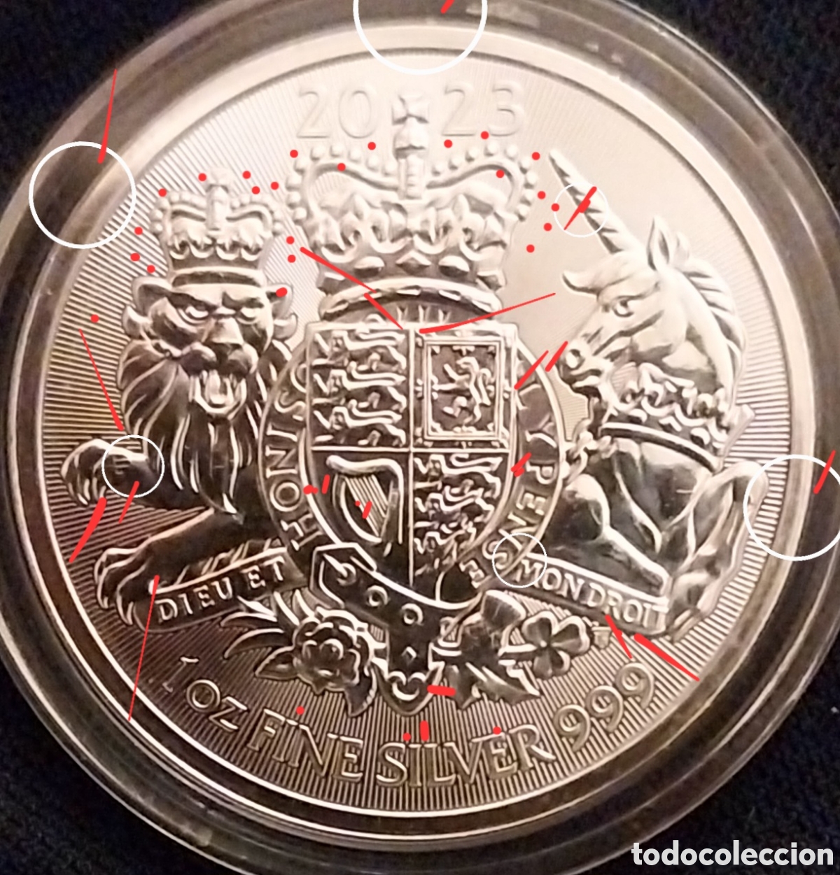 Monedas con errores: ONZA CARLOS III 2023 FDC - ERROR GOLPE DESCENTRADO