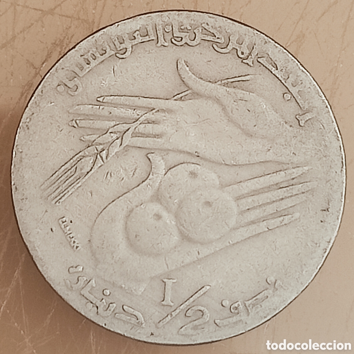 Monedas con errores: Moneda Tunez (1997) error de acu&ntilde;aci&oacute;n - Foto 1