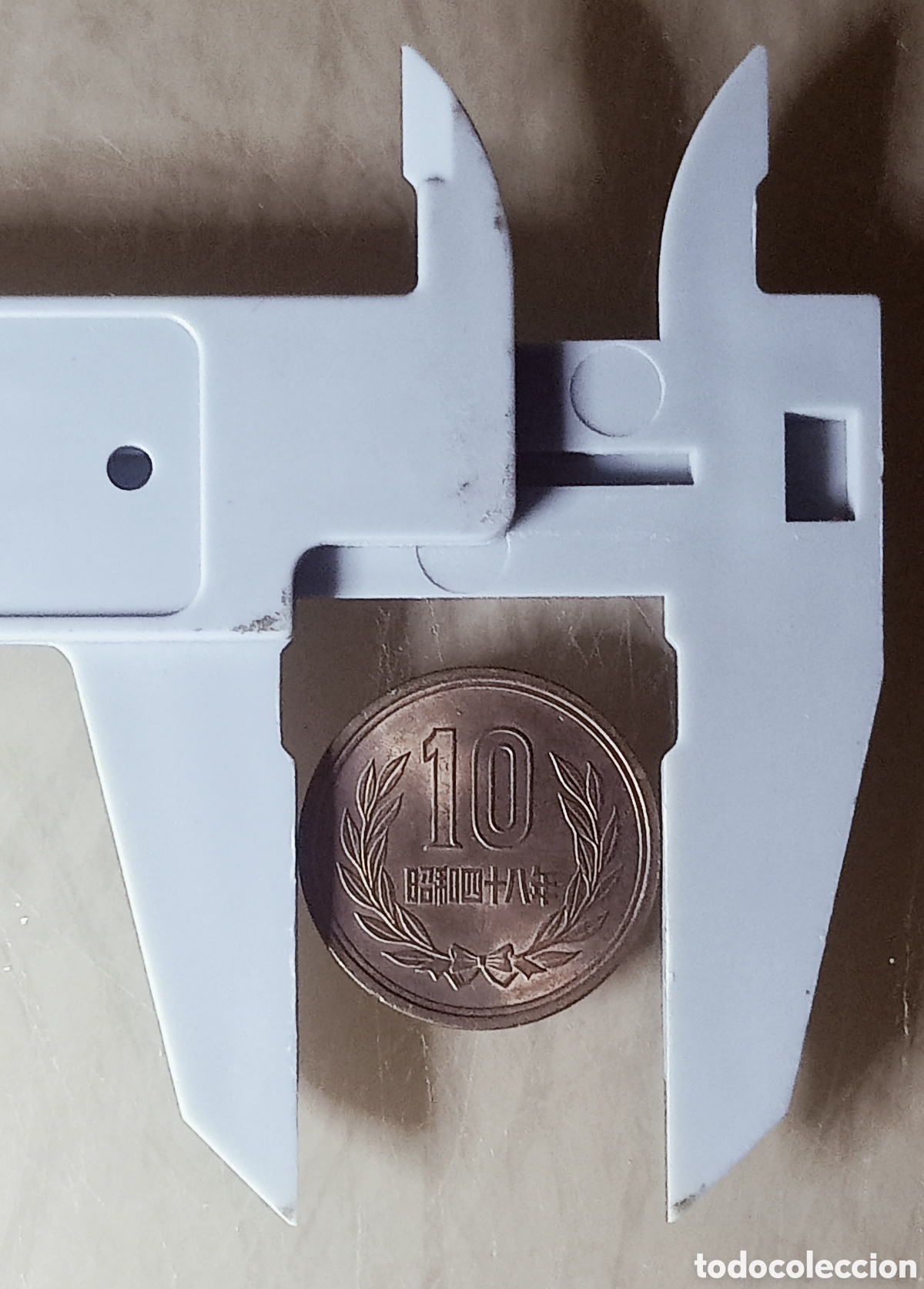 Monedas con errores: Moneda Jap&oacute;n(1973)Cu&ntilde;o Rotado - Foto 3