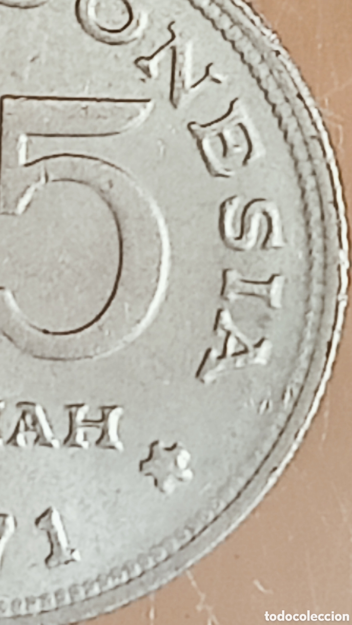 Monedas con errores: Moneda Indonesia (1971) error de ceca - Foto 19
