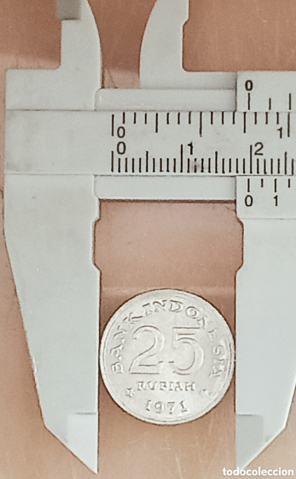 Monedas con errores: Moneda Indonesia (1971) error de ceca - Foto 24